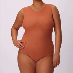 Parade mesh bodysuit size M gingersnap